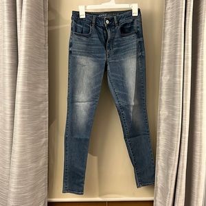 Faded American Eagle blue jeans